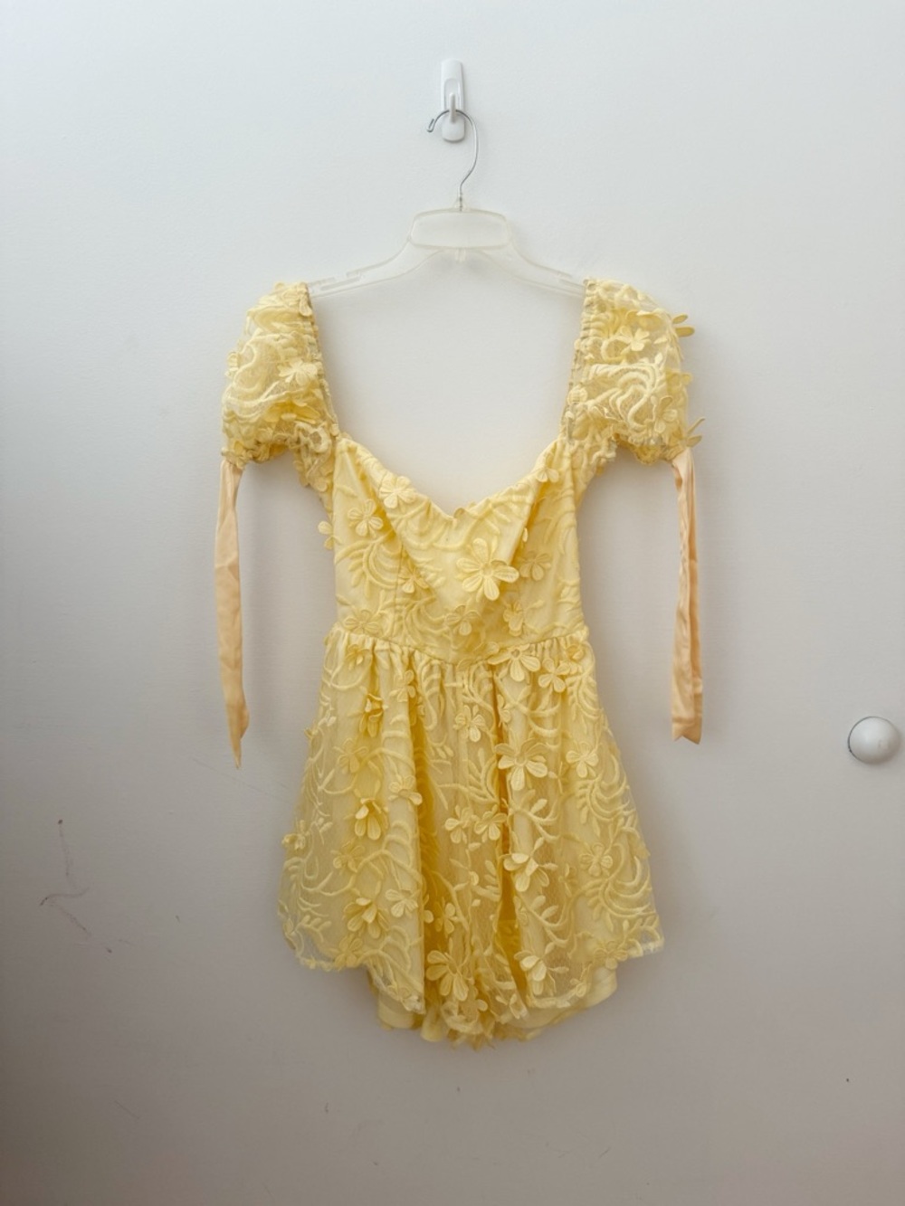 Love Triangle lace romper with tie back in yellow